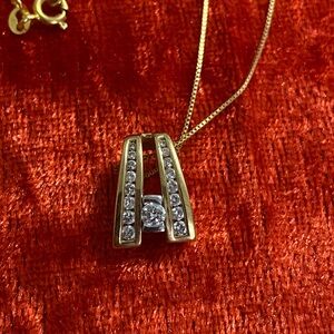 Elegant Gold and Diamond Art Deco Pendant Necklace